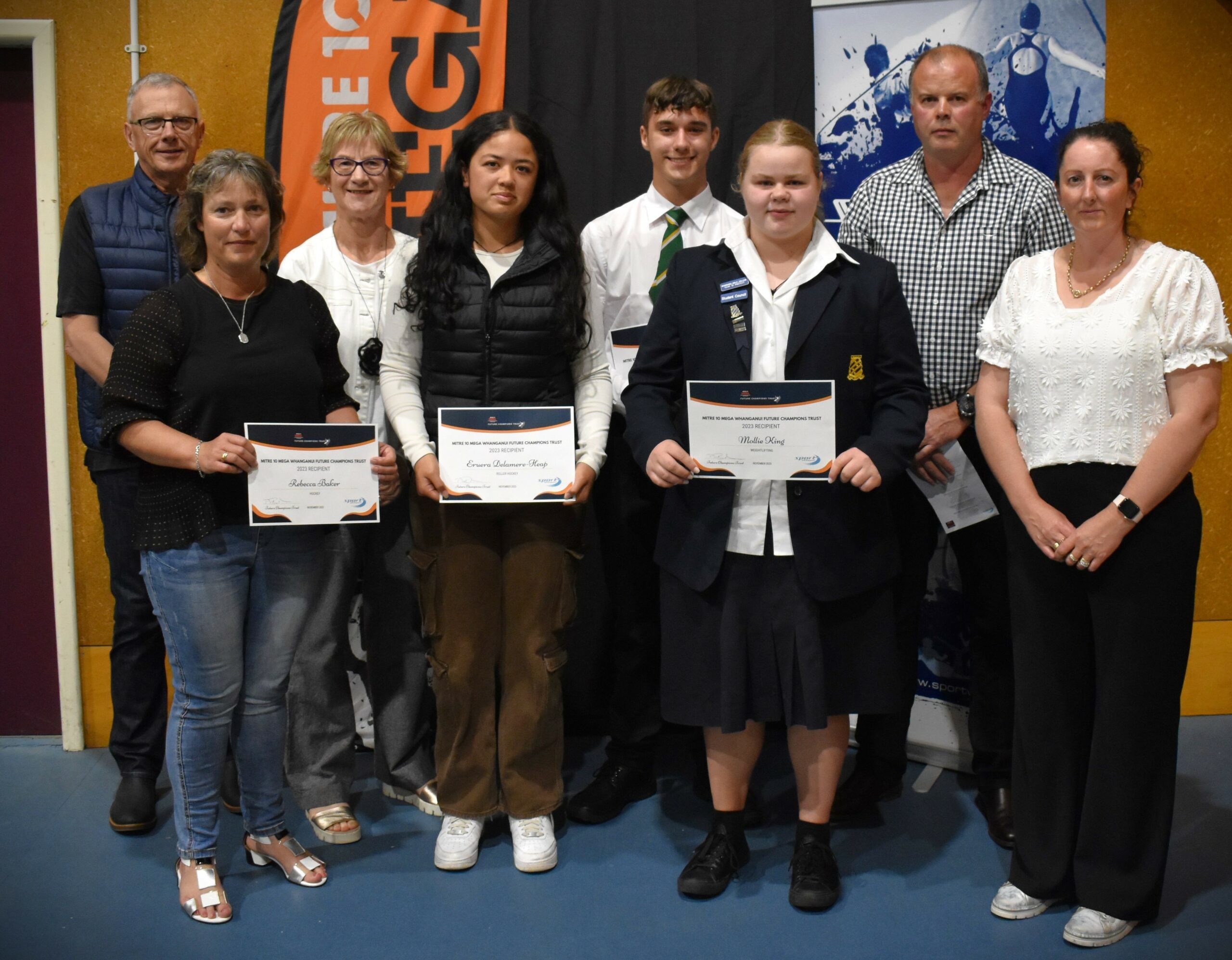 Mitre 10 MEGA Whanganui Future Champions Trust members with funding recipients at the 2023 Whanganui Secondary School Sports Awards.